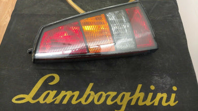 LAMBORGHINI MURCIELAGO COUPE ROADSTER DRIVER SIDE TAIL LIGHT OEM 410945095A